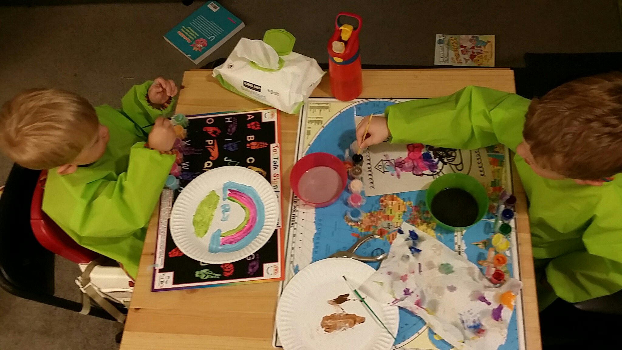 boys using watercolor paints