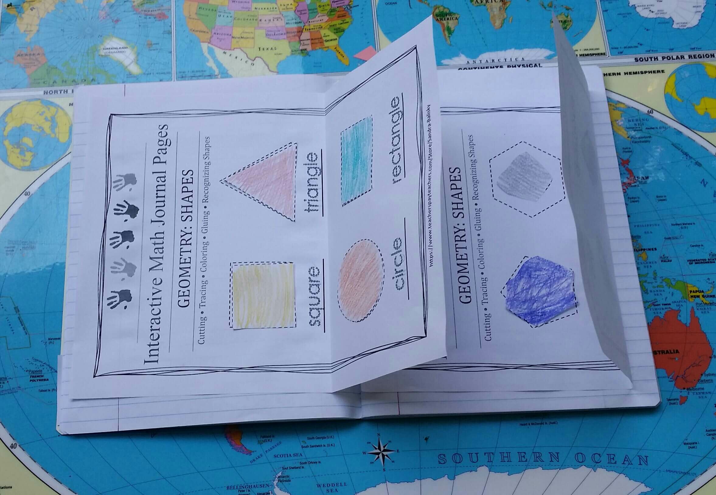 Shapes practice pages glued into the interactive math journal